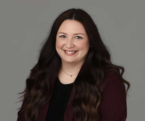 Professional portrait of Amanda Castro, Esq., attorney at Hera Law Group in Milton, specializing in family and divorce law.