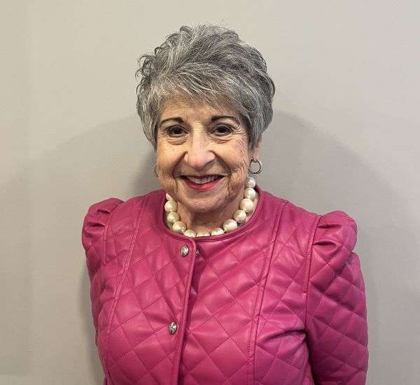 Nadine Fishbone, Accounts Receivable representative of Hera Law Group, Family & Divorce Lawyers Maynard, smiling directly at the camera